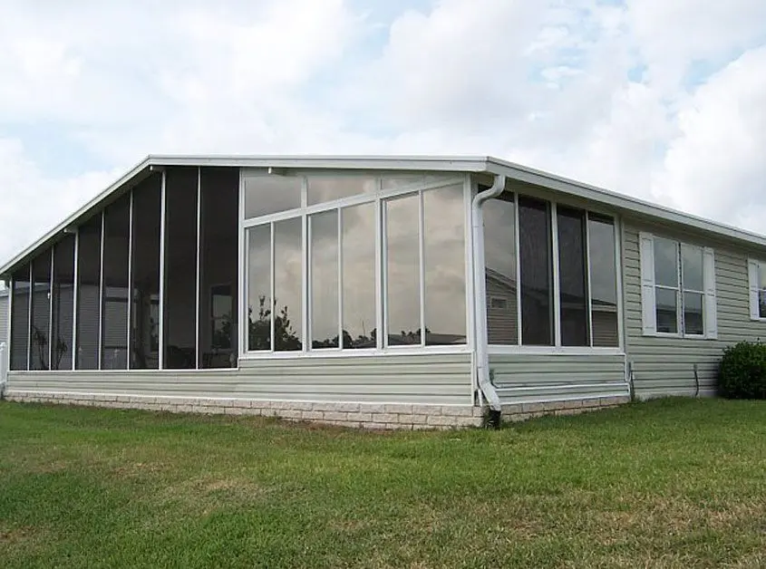 A large white house with a lot of windows